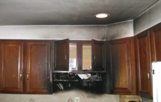 soot on walls and cabinets from kitchen fire damage in albany ny