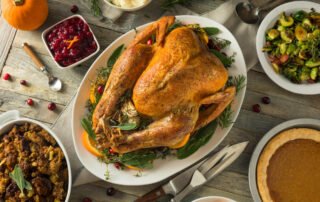 thanksgiving dinner on table after following thanksgiving fire safety tips