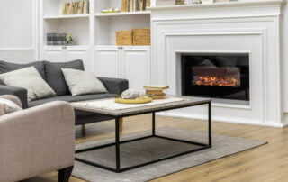 heating-your-home-safely-with-modern-working-fireplace-in-neutral-living-room