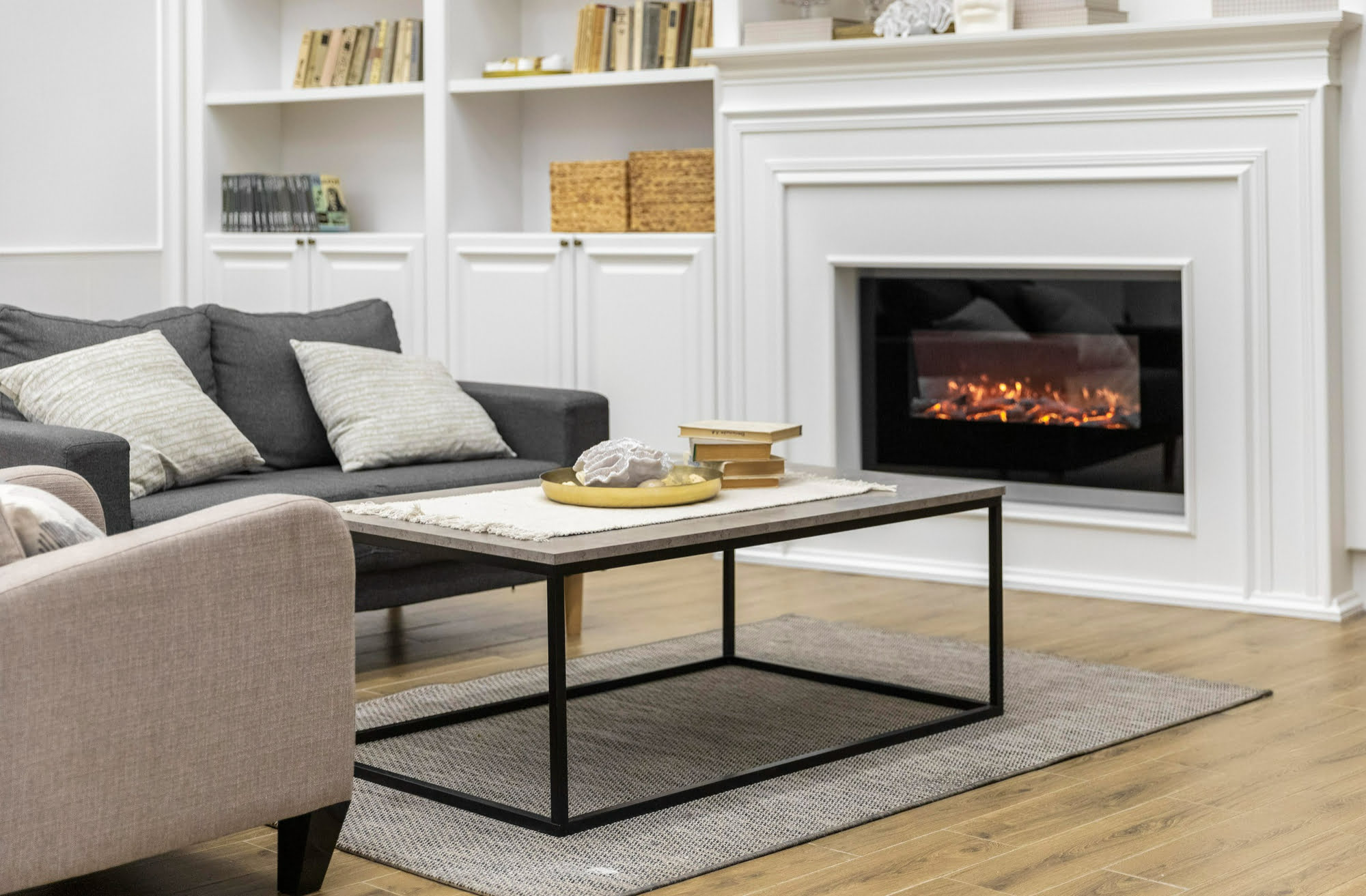 heating-your-home-safely-with-modern-working-fireplace-in-neutral-living-room