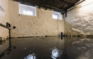 water-damage-household-insurance-after-pipe-burst-flood-basement-garage-with-mold